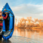 What should a beginner wear kayaking?